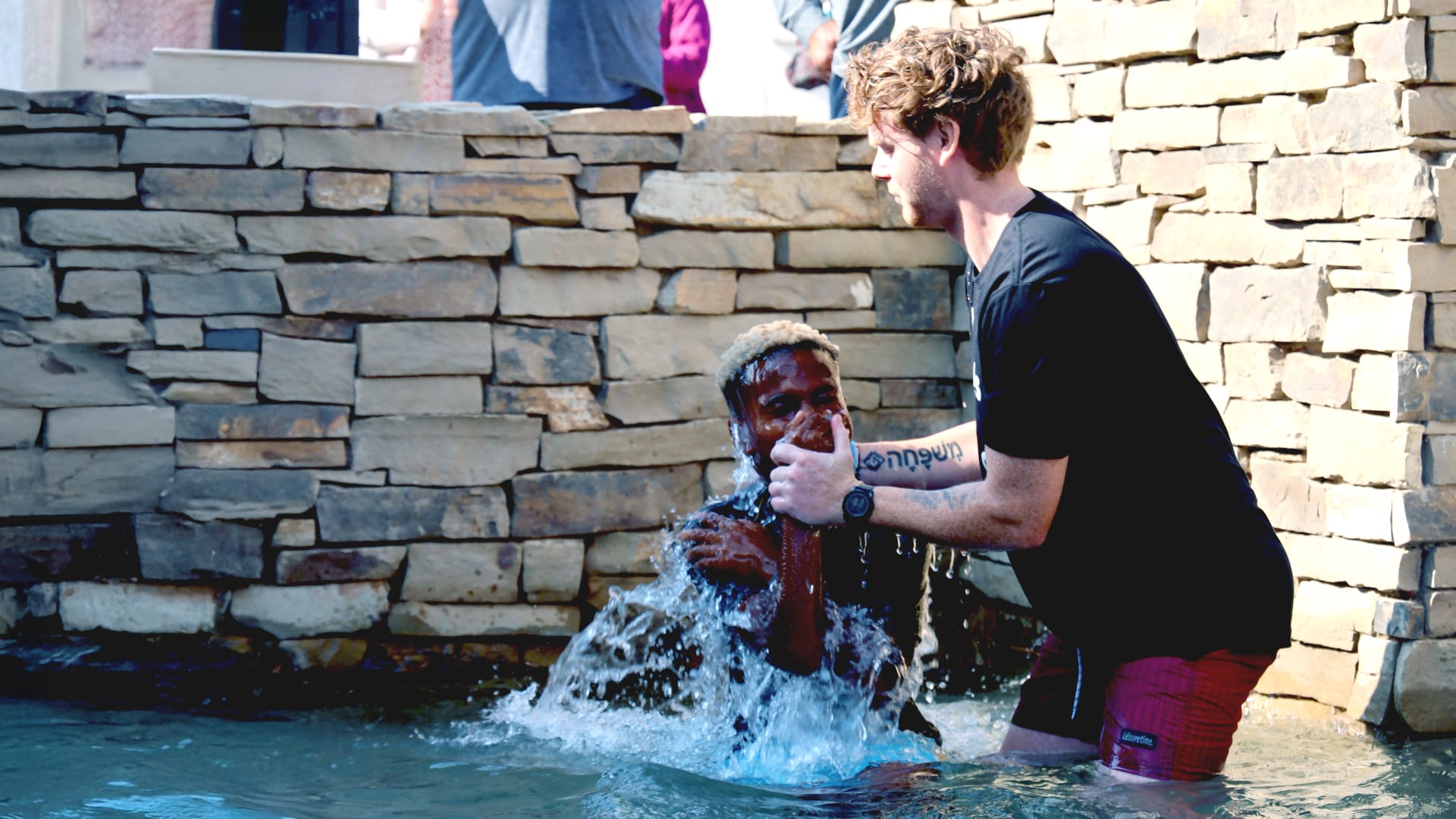 NewCov baptism ceremony capturing a meaningful faith moment, spiritual commitment, and celebration within the community