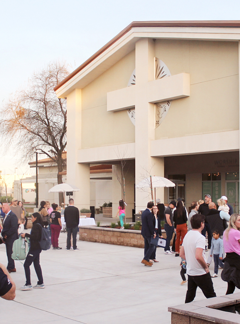 Families arriving at the Fresno New Covenant Community Church campus on a Sunday morning